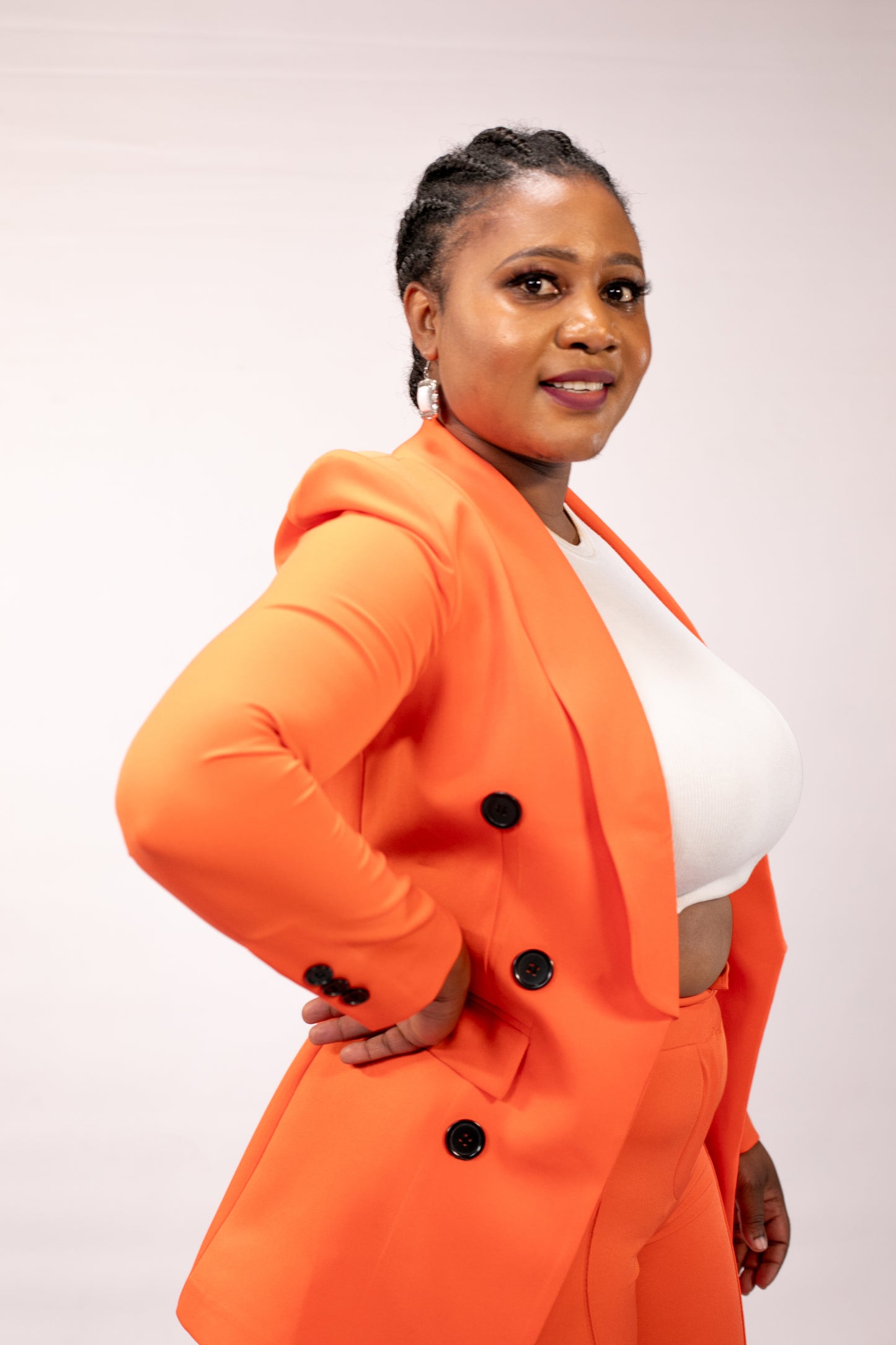 Orange Suit with Black Buttons